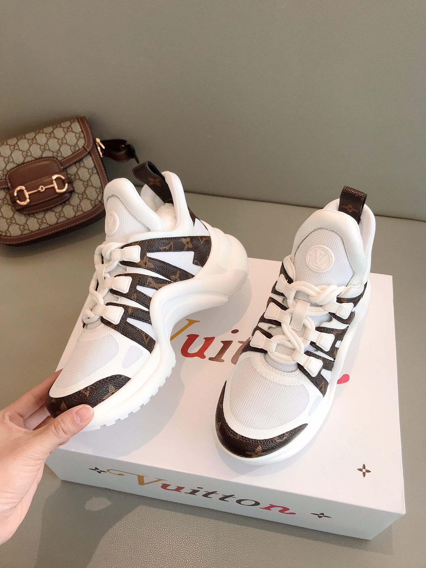 l**is V*t*n archlight sneaker