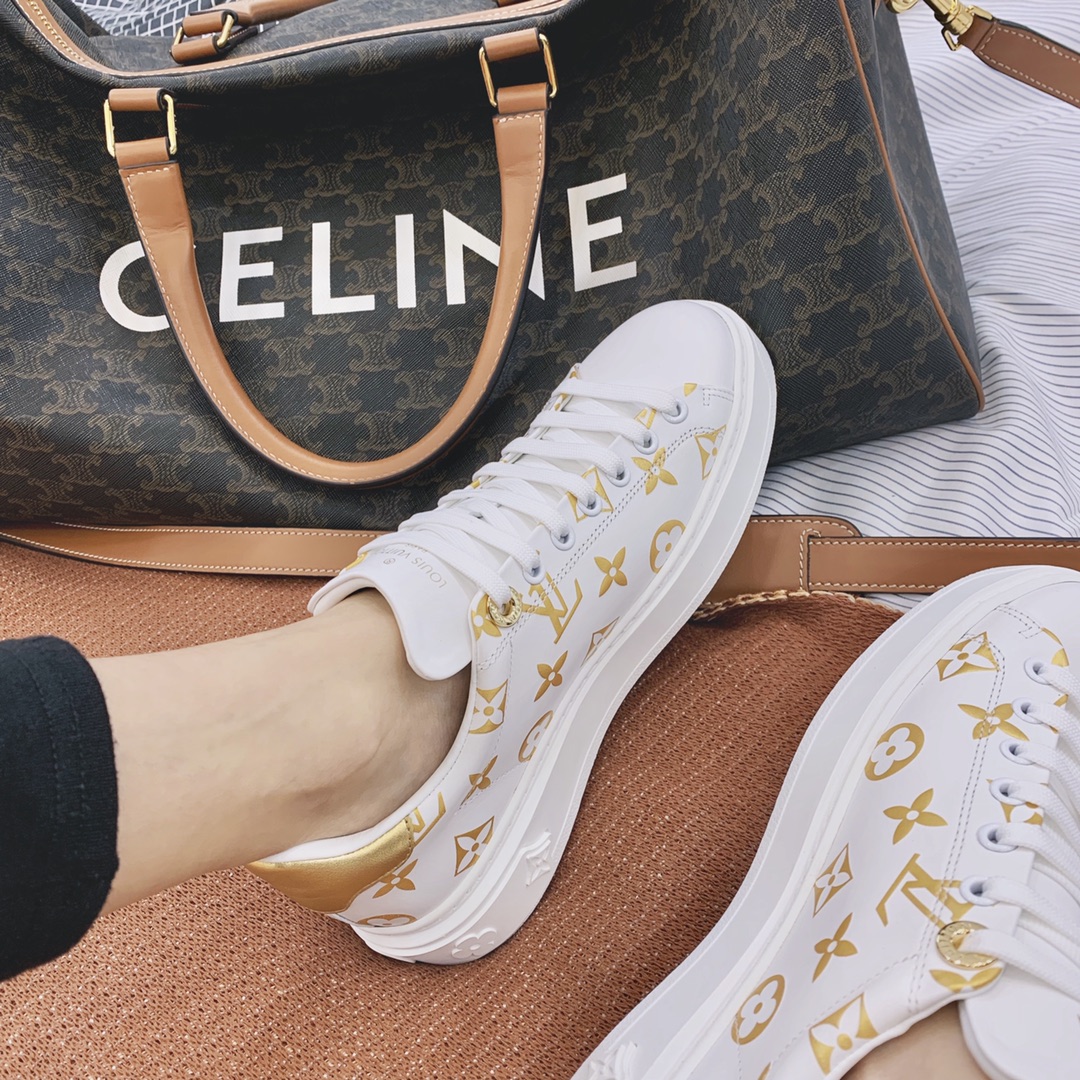 l**is V*t*n low-top sneakers