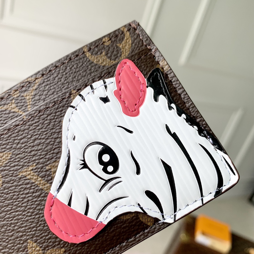 l**is V*t*n wallet-11 x 7 x 0.5cm