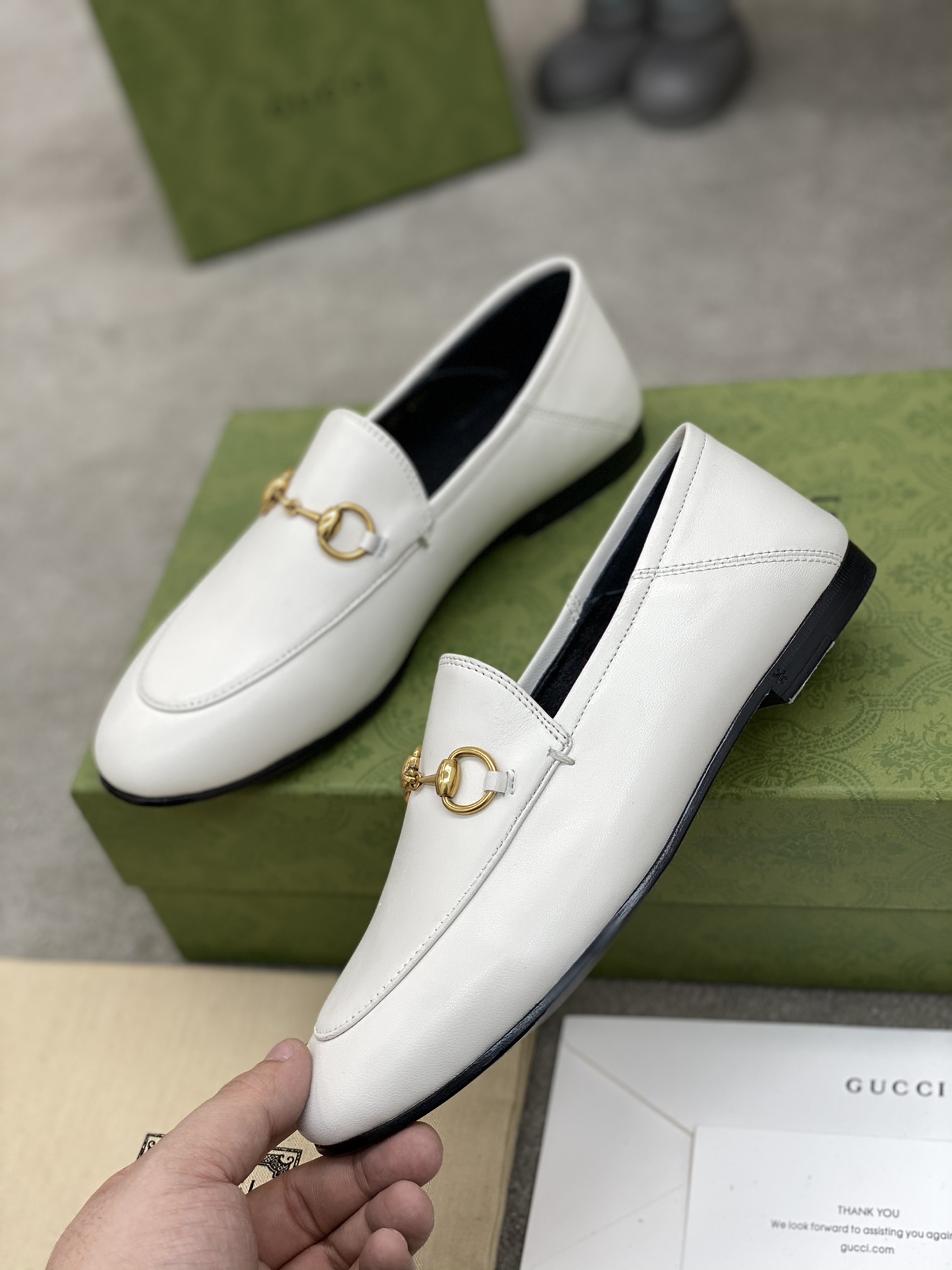 G*u*i loafers